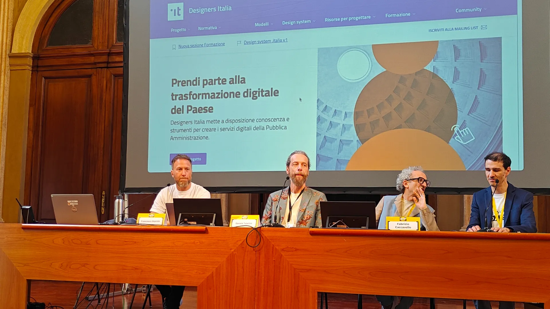 Stage photo of the talk about accessibility and Design System Italia